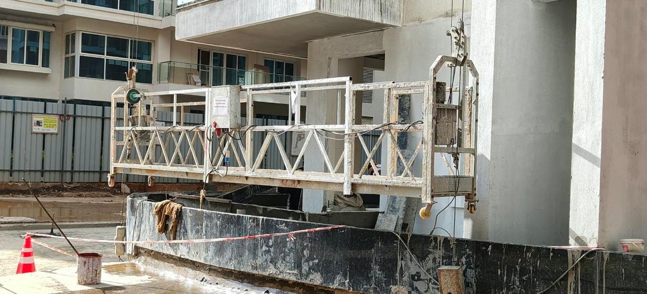 Rope Suspended Platform Working on Facade